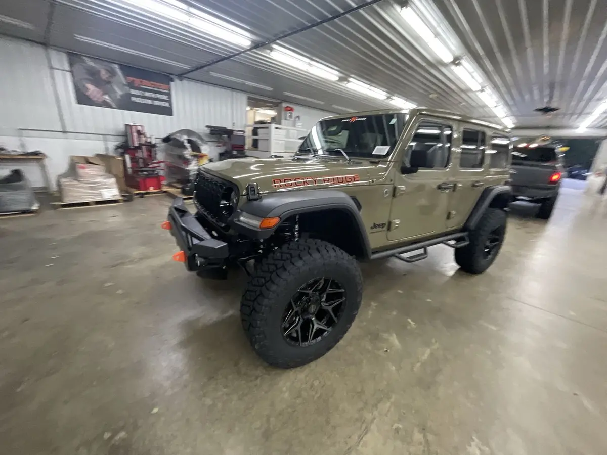 2025 Jeep Wrangler Unlimited 4X4 Rocky Ridge Premium Lifted Truck 1